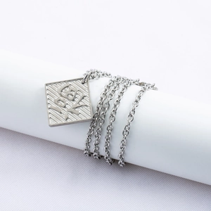 Silver stainless steel long necklace with square Fu pendant and embossed texture