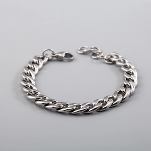 Bracelet gourmette argenté en acier inoxydable avec fermoir mousqueton et chaînette