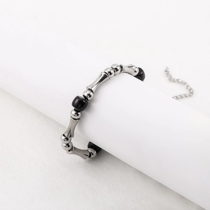 Adjustable bamboo-style stainless steel beaded bracelet with black and silver beads