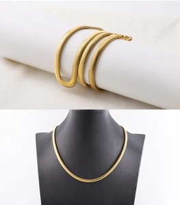 Detail view of 5mm gold plated snake bone chain showing its flexible texture and luster