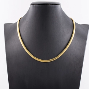 5mm gold plated stainless steel herringbone snake chain necklace on a black velvet display