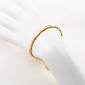 18K gold plated stainless steel snake chain bracelet featuring fine scale texture and lobster clasp