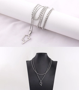 Close-up of double-layer stainless steel lightning pendant necklace for men
