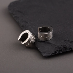 Minimalist matte silver titanium steel huggie earrings with a row of small diamonds