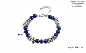 Detail of 8mm blue tiger eye beaded bracelet with silver lobster clasp and extension chain