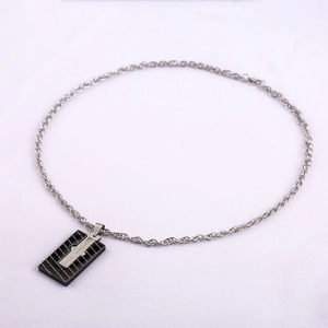 Men's stainless steel necklace featuring a black rectangular cross pendant with forever love engraving