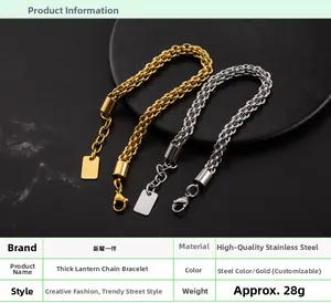 Detail view of gold and silver braided lantern chain bracelets with lobster clasp closure