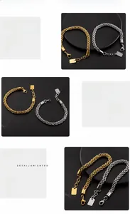 Detail of woven stainless steel chain bracelet with lobster clasp and metal tag