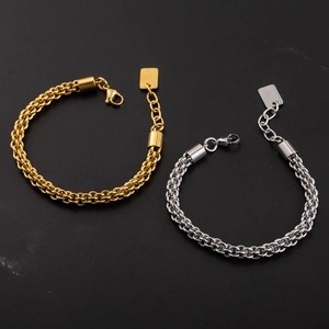 Men's thick woven chain bracelet in gold and silver finish stainless steel