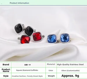 Macro detail of square stainless steel cufflinks with inlaid black, red, and blue gemstones