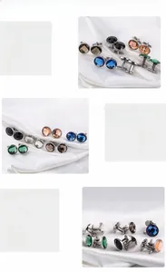 Macro detail of round crystal cufflinks in stainless steel with colorful faceted stones