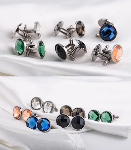 Detailed macro view of 2cm stainless steel round cufflinks with colorful gemstones