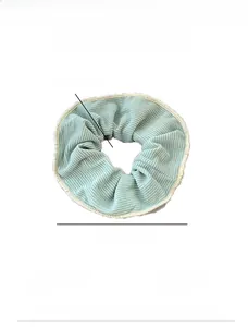 Detail showing dimensions of light green waffle texture scrunchie with 11cm diameter