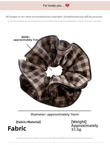 Detail view of large brown plaid scrunchie with 16cm diameter and fabric texture info