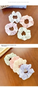 Detailed set of four floral and plaid organza scrunchies in pastel candy colors