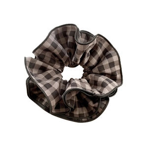 Classic black and gray plaid double-layered scrunchie with elegant ruffled edges for women