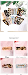 Close-up of marble pattern acetate hair clips and metal duckbill clip details