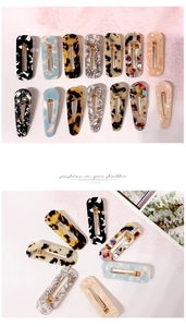 Detailed collection of marble and floral acetate hair clips in rectangular and drop shapes