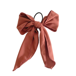 Elegant dusty pink bow hair scrunchie with long ribbons made of soft chiffon fabric
