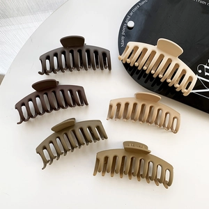 Set of 6 large matte hair claw clips in earth tones for thick hair styling