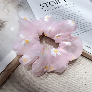Pink daisy print organza scrunchie hair tie for women with a light mesh texture