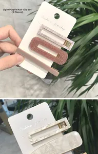 Dettaglio del set di 3 fermagli per capelli viola chiaro in acrilico e base in metallo