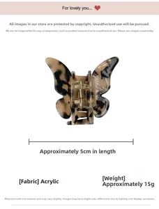 Detailed view of a 5cm tortoise shell butterfly hair claw clip made of acrylic
