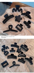 Set of matte black hair clips in floral and geometric shapes on a soft knit background