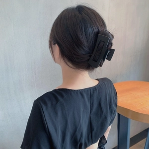 Elegant matte black rectangular hair claw clip for French style updo hairstyles