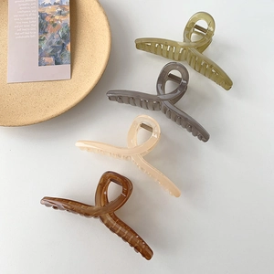 Minimalist large hair claw clips set in olive, grey, beige and amber for women's hair styling