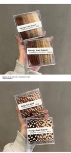 Detailed view of elastic hair bands with knit texture in a transparent storage box