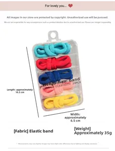 Detailed view of 25 colorful seamless elastic hair ties in a clear 5-grid storage case