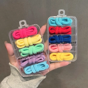 Set of 25 colorful seamless high elasticity hair ties in a clear 5-compartment box