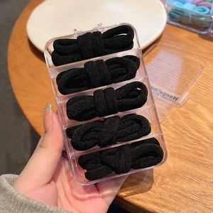 Black seamless thick elastic hair ties set of 5 with a portable clear storage box