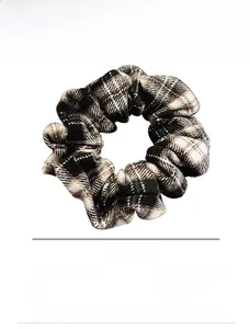 Detail view of 13cm black and white plaid cotton scrunchie with high texture fabric