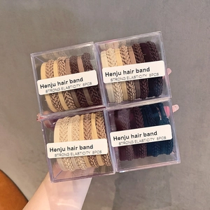 Eight-piece set of high elasticity woven hair ties in various earthy tones and textures