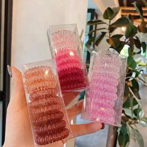 Lot de 9 élastiques à cheveux spirales colorés dans un emballage transparent dégradé