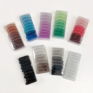 Lot de 9 boîtes d'élastiques à cheveux spirales colorées avec dégradé transparent