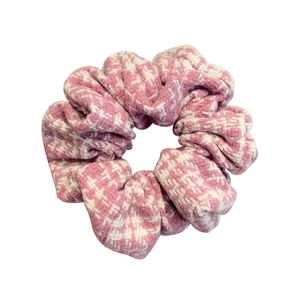 Pink and white houndstooth knit scrunchie with soft fabric and elastic hair tie