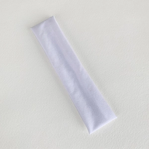Close-up of lavender knitted sports headband showing detailed elastic fabric texture