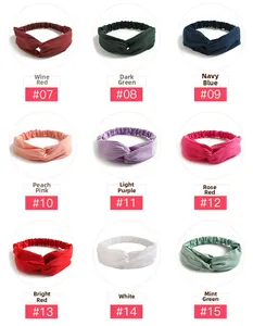 Matrix view of nine different colors of elastic knitted cotton cross headbands for women