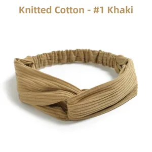 Detailed view of khaki knitted cotton twisted headband with elastic back and ribbed texture
