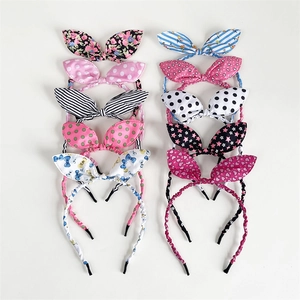 Set of ten floral and polka dot fabric bow headbands with rabbit ear design for women
