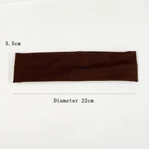 Deep brown 5.5cm wide athletic headband for yoga and running, flat lay size measurement