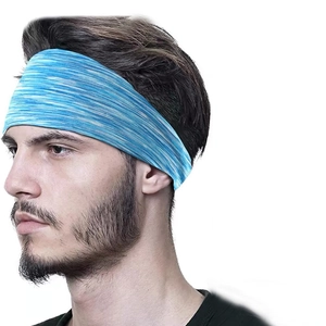 Close-up of blue and white striped elastic sweatband on male model for gym and fitness