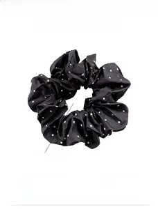 Detailed size view of black and white polka dot satin scrunchie showing 6cm width