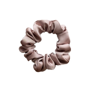 Elegant champagne satin silk scrunchie with smooth texture and glossy finish hair tie
