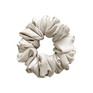Elegant cream satin scrunchie with glossy pleated texture and high elasticity for women