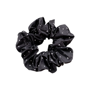 Classic black satin hair scrunchie with white polka dots for elegant hairstyles