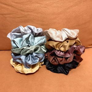 Colorful satin silk scrunchies set with pleated texture and soft gloss finish